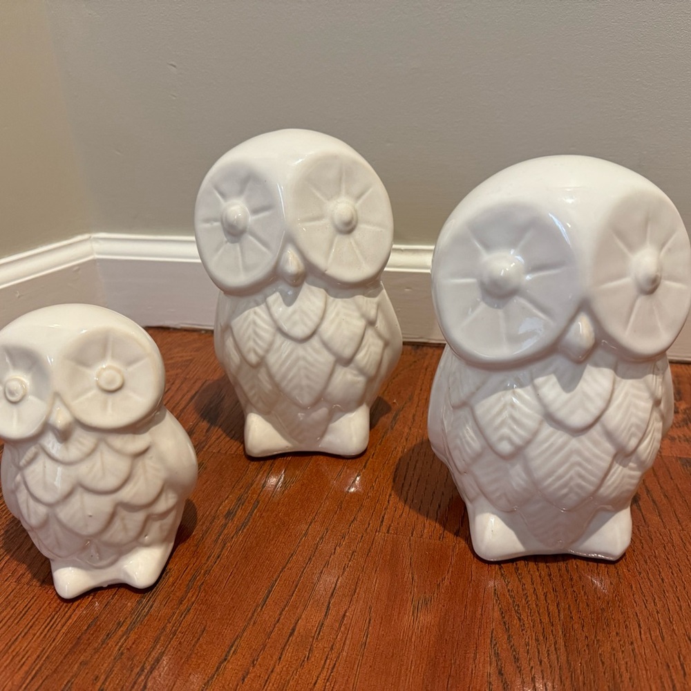 Set of three white decorative ceramic owls